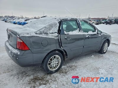 Trzecie zdjęcie samochodu z tyłu: 2007 FORD FOCUS ZX4 VIN:1FAFP34N57W297003 - miniatura