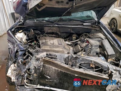 Zdjęcie 12 z 13 samochodu: 2004 FORD ESCAPE LIMITED VIN:1FMCU94184KA41877 - miniatura