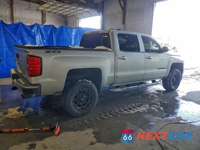 Trzecie zdjęcie samochodu z tyłu: 2017 CHEVROLET SILVERADO K1500 LT VIN:3GCUKREC6HG437088 - miniatura