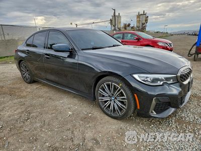 Czwarte zdjęcie samochodu z boku: 2021 BMW M340I VIN:3MW5U7J02M8B56504 - miniatura