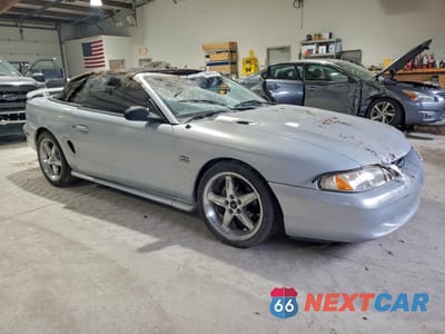 Czwarte zdjęcie samochodu z boku: 1994 FORD MUSTANG GT VIN:1FALP45T8RF198717 - miniatura