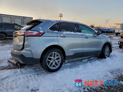 Trzecie zdjęcie samochodu z tyłu: 2023 FORD EDGE SEL VIN:2FMPK4J92PBA59097 - miniatura