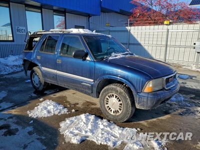 Czwarte zdjęcie samochodu z boku: 1999 GMC JIMMY VIN:1GKDT13WXX2558102 - miniatura
