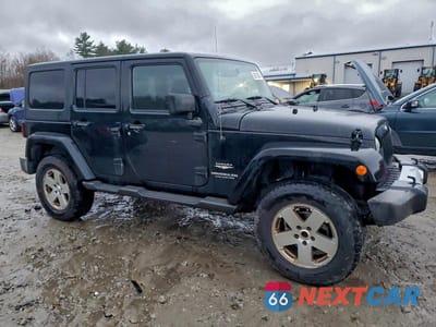 Czwarte zdjęcie samochodu z boku: 2011 JEEP WRANGLER UNLIMITED SAHARA VIN:1J4BA5H13BL603682 - miniatura