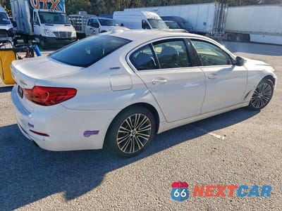 Trzecie zdjęcie samochodu z tyłu: 2019 BMW 530E VIN:WBAJA9C54KB393986 - miniatura
