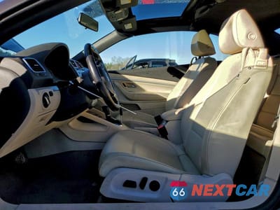 Zdjęcie 7 z 12 samochodu: 2014 VOLKSWAGEN EOS KOMFORT VIN:WVWBW8AH4EV003035 - miniatura