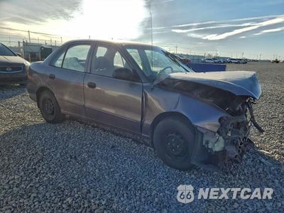 Czwarte zdjęcie samochodu z boku: 1999 HYUNDAI ACCENT GL VIN:KMHVF24NXXU560404 - miniatura