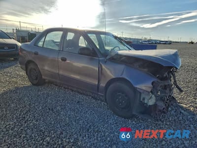 Czwarte zdjęcie samochodu z boku: 1999 HYUNDAI ACCENT GL VIN:KMHVF24NXXU560404 - miniatura