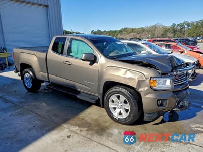 Czwarte zdjęcie samochodu z boku: 2015 GMC CANYON SLE VIN:1GTH5BE32F1222187 - miniatura