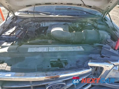 Zdjęcie 11 z 12 samochodu: 2000 FORD F150 VIN:1FTRX18W4YNB17399 - miniatura