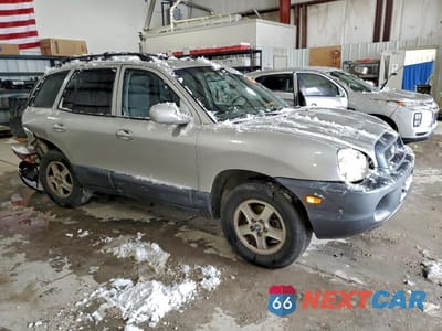 Czwarte zdjęcie samochodu z boku: 2004 HYUNDAI SANTA FE GLS VIN:KM8SC13D44U853676 - miniatura