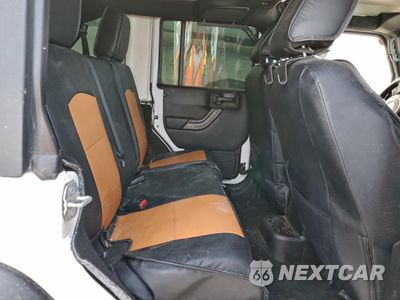 Zdjęcie 10 z 13 samochodu: 2015 JEEP WRANGLER UNLIMITED SPORT VIN:1C4BJWDG0FL506810 - miniatura