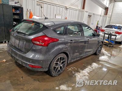 Trzecie zdjęcie samochodu z tyłu: 2017 FORD FOCUS SEL VIN:1FADP3M26HL306405 - miniatura