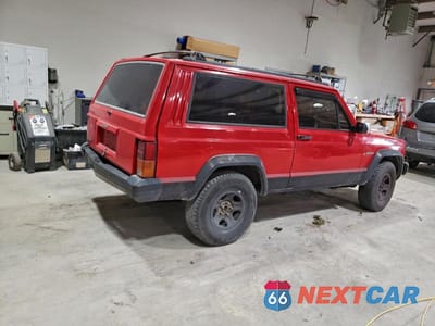 Trzecie zdjęcie samochodu z tyłu: 1995 JEEP CHEROKEE SPORT VIN:1J4FT67S2SL576986 - miniatura