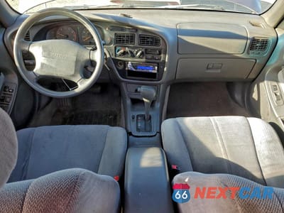 Zdjęcie 8 z 12 samochodu: 1996 TOYOTA CAMRY LE VIN:4T1EF12K5TU125643 - miniatura