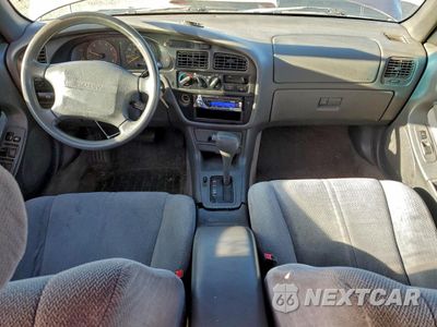 Zdjęcie 8 z 12 samochodu: 1996 TOYOTA CAMRY LE VIN:4T1EF12K5TU125643 - miniatura