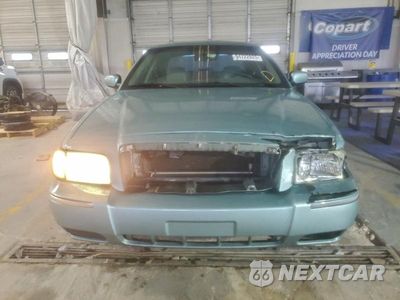 Piąte zdjęcie samochodu w środku: 2006 MERCURY GRAND MARQUIS LS VIN:2MEFM75V06X634719 - miniatura