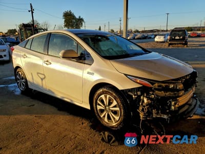 Czwarte zdjęcie samochodu z boku: 2017 TOYOTA PRIUS PRIME VIN:JTDKARFP5H3053494 - miniatura