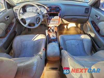 Zdjęcie 8 z 14 samochodu: 2003 HYUNDAI SONATA GLS VIN:KMHWF35H23A873767 - miniatura
