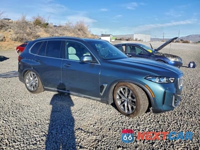 Czwarte zdjęcie samochodu z boku: 2026 BMW X5 XDRIVE50E VIN:5UX43EU01T9120789 - miniatura