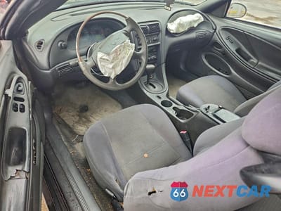 Zdjęcie 8 z 11 samochodu: 2004 FORD MUSTANG VIN:1FAFP406X4F222913 - miniatura