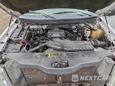 Zdjęcie 11 z 14 samochodu: 2004 FORD F150 VIN:1FTPX14594NB45987 - miniatura