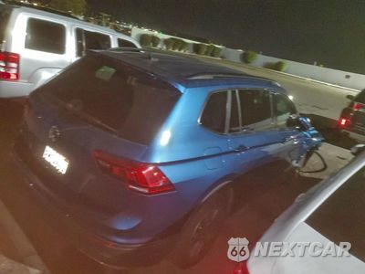 Trzecie zdjęcie samochodu z tyłu: 2019 VOLKSWAGEN TIGUAN SE VIN:3VV3B7AX2KM181177 - miniatura