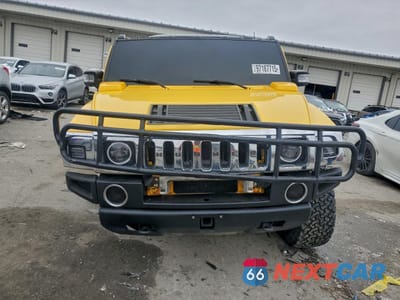 Piąte zdjęcie samochodu w środku: 2003 HUMMER H2 VIN:5GRGN23U23H136418 - miniatura