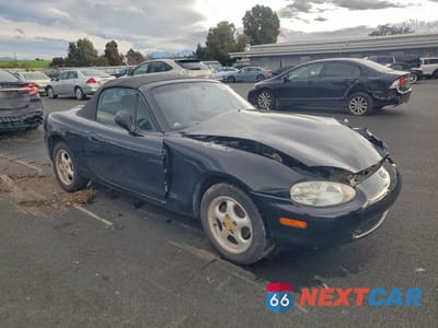 Czwarte zdjęcie samochodu z boku: 1999 MAZDA MX-5 MIATA VIN:JM1NB3537X0116732 - miniatura