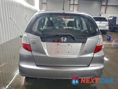 Zdjęcie 6 z 11 samochodu: 2010 HONDA FIT VIN:JHMGE8H21AS023439 - miniatura