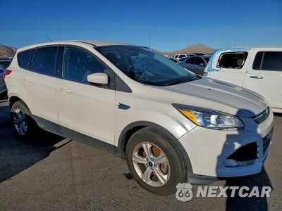 Czwarte zdjęcie samochodu z boku: 2014 FORD ESCAPE SE VIN:1FMCU0GX5EUB64148 - miniatura