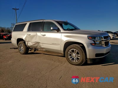 Czwarte zdjęcie samochodu z boku: 2015 CHEVROLET SUBURBAN K1500 LT VIN:1GNSKJKC4FR147031 - miniatura