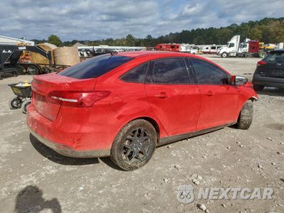 Trzecie zdjęcie samochodu z tyłu: 2016 FORD FOCUS SE VIN:1FADP3F23GL336845 - miniatura