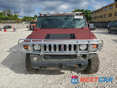 Piąte zdjęcie samochodu w środku: 2005 HUMMER H2 VIN:5GRGN23U95H122700 - miniatura