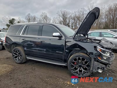 Czwarte zdjęcie samochodu z boku: 2017 CHEVROLET TAHOE K1500 PREMIER VIN:1GNSKCKC5HR246679 - miniatura