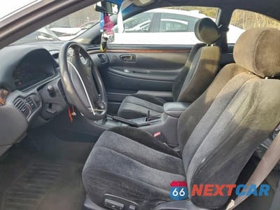 Zdjęcie 7 z 12 samochodu: 2000 TOYOTA CAMRY SOLARA VIN:2T1CG22P4YC388012 - miniatura