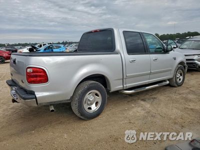 Trzecie zdjęcie samochodu z tyłu: 2001 FORD F150 SUPERCREW VIN:1FTRW07LX1KD70013 - miniatura