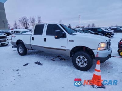 Czwarte zdjęcie samochodu z boku: 2003 FORD F250 SUPER DUTY VIN:1FTNW21P43ED51108 - miniatura
