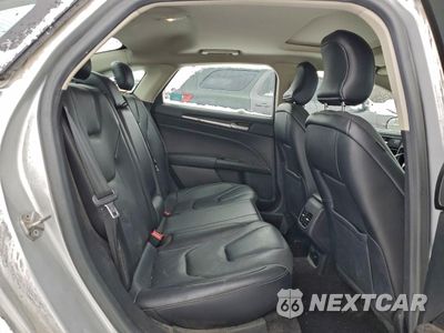 Zdjęcie 10 z 14 samochodu: 2017 FORD FUSION TITANIUM HEV VIN:3FA6P0RU5HR357431 - miniatura