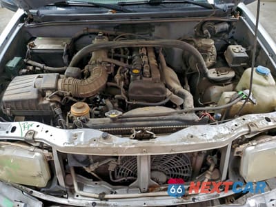 Zdjęcie 12 z 15 samochodu: 2001 CHEVROLET TRACKER VIN:2CNBJ13C016952812 - miniatura