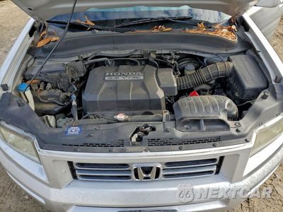 Zdjęcie 11 z 12 samochodu: 2006 HONDA RIDGELINE RTL VIN:2HJYK16556H536464 - miniatura