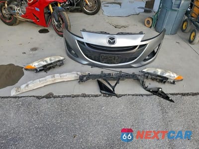Zdjęcie 13 z 14 samochodu: 2013 MAZDA 5 VIN:JM1CW2CL8D0153258 - miniatura
