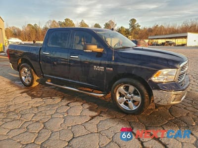 Czwarte zdjęcie samochodu z boku: 2016 RAM 1500 SLT VIN:3C6RR6LT4GG370659 - miniatura