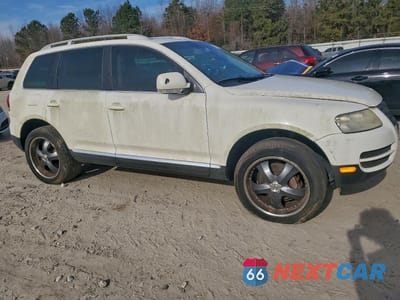 Czwarte zdjęcie samochodu z boku: 2007 VOLKSWAGEN TOUAREG V6 VIN:WVGZE77L77D018026 - miniatura
