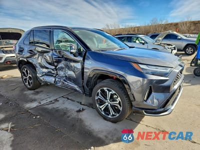 Czwarte zdjęcie samochodu z boku: 2024 TOYOTA RAV4 PRIME XSE VIN:JTMFB3FV7RD202641 - miniatura
