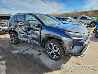 Czwarte zdjęcie samochodu z boku: 2024 TOYOTA RAV4 PRIME XSE VIN:JTMFB3FV7RD202641 - miniatura