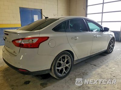 Trzecie zdjęcie samochodu z tyłu: 2014 FORD FOCUS SE VIN:1FADP3F21EL217544 - miniatura