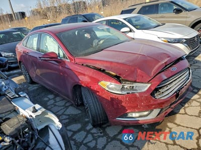 Czwarte zdjęcie samochodu z boku: 2017 FORD FUSION TITANIUM VIN:3FA6P0K97HR118288 - miniatura
