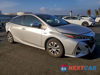 Czwarte zdjęcie samochodu z boku: 2021 TOYOTA PRIUS PRIME LE VIN:JTDKAMFP3M3178555 - miniatura