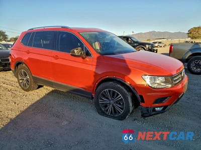 Czwarte zdjęcie samochodu z boku: 2018 VOLKSWAGEN TIGUAN SE VIN:3VV2B7AX3JM015549 - miniatura